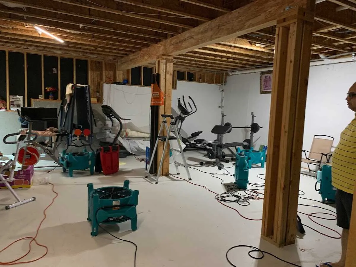 Basement drying equipment setup for Contents Cleaning & Restoration in Muskego
