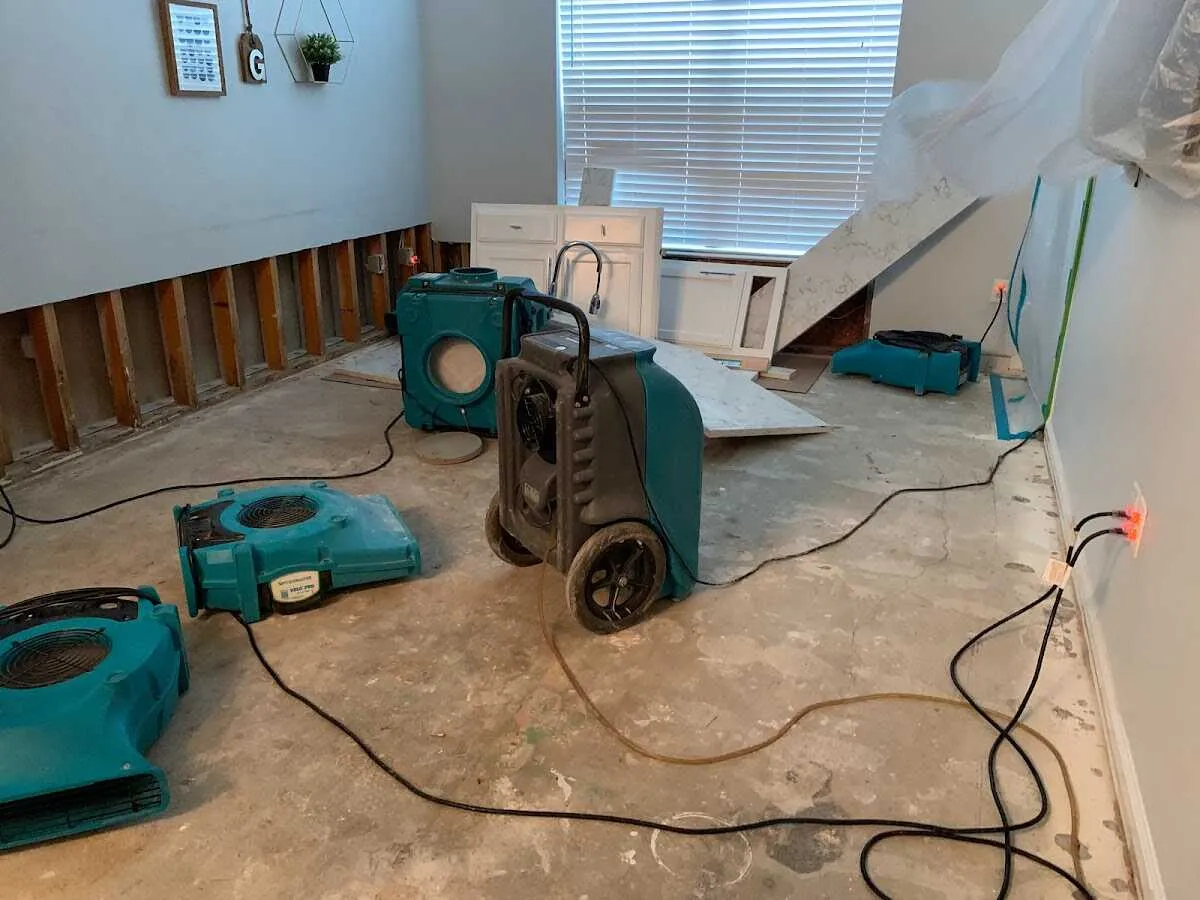 Dehumidifier in flood-cut room for Water Damage Restoration in Muskego